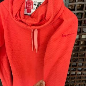 Hot pink cowl neck Nike Sweatshirt.  Slim fit on top.